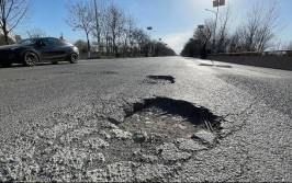 水泥路面出现坑洼里面还有裸露钢筋 西安航天基地：下周二完成维修(坑洼路面钢筋道路裸露)