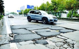 解决了吗丨唐山市路北区：道路坑洼不平通行受阻？已维修(平台道路坑洼陈女士破损)